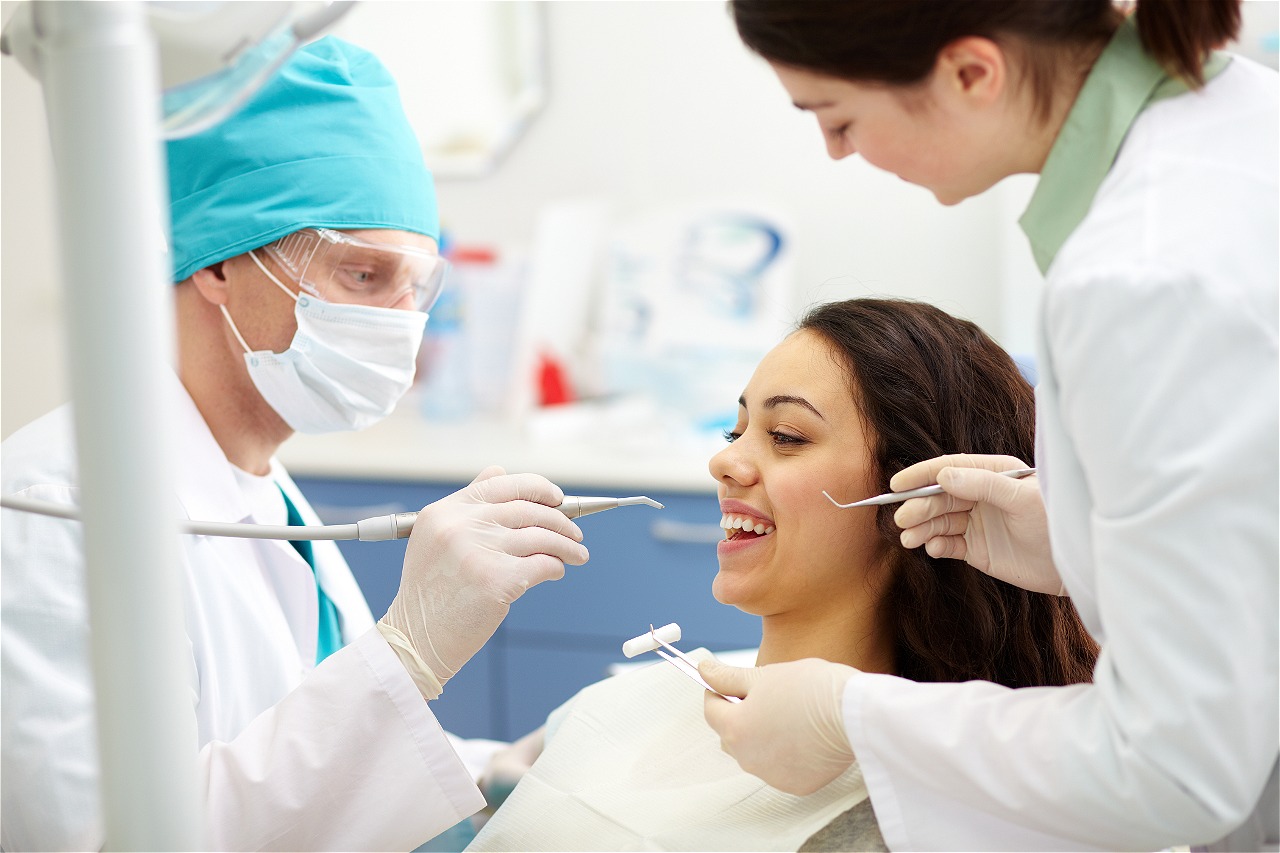 dentist-examining-a-patient-s-teeth.jpg dentist-examining-a-patient-s-teeth.jpg